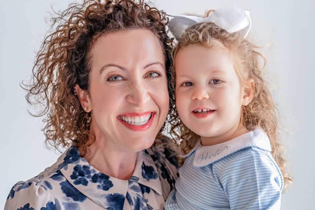 A close up of a smiling mom and daughter at the Lumen Room in Austin, TX | Austin Mommy and Me Photographer